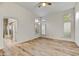 Bright bedroom with light wood flooring and ensuite bathroom at 7500 E Boulders Pkwy # 11, Scottsdale, AZ 85266