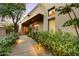 Inviting walkway to the home's entrance, beautifully landscaped at 7500 E Boulders Pkwy # 11, Scottsdale, AZ 85266