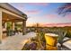 Covered patio with seating area and a stone water feature at 7500 E Boulders Pkwy # 11, Scottsdale, AZ 85266