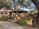 Relaxing shaded gazebo in community with seating and desert landscaping at 7668 E Thunderhawk Rd, Scottsdale, AZ 85255