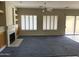 Living room with fireplace and carpet at 7668 E Thunderhawk Rd, Scottsdale, AZ 85255