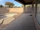 Covered patio overlooking a kidney-shaped pool at 7668 E Thunderhawk Rd, Scottsdale, AZ 85255