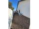 Landscaped backyard with gravel and privacy wall at 7685 W San Miguel Ave, Glendale, AZ 85303