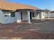 Home features a spacious backyard with covered patio at 7685 W San Miguel Ave, Glendale, AZ 85303