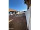 Large backyard with covered patio and gravel landscaping at 7685 W San Miguel Ave, Glendale, AZ 85303