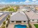 Aerial view of house with pool and backyard at 7718 W Raymond St, Phoenix, AZ 85043