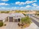 Aerial view of a house and surrounding area at 7718 W Raymond St, Phoenix, AZ 85043