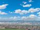 Aerial view of city skyline and mountain range at 7718 W Raymond St, Phoenix, AZ 85043