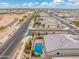 Aerial view of house with pool and neighborhood at 7718 W Raymond St, Phoenix, AZ 85043