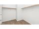 Large walk-in closet with double hanging rods at 7718 W Raymond St, Phoenix, AZ 85043