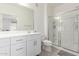 Clean bathroom with white vanity, large mirror, and walk-in shower at 7820 E Baseline Rd # 103, Mesa, AZ 85209