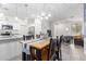 Dining area with table and chairs, open to kitchen and living room at 7820 E Baseline Rd # 103, Mesa, AZ 85209