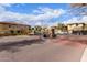 Gated community entrance with brick pillars at 7820 E Baseline Rd # 103, Mesa, AZ 85209