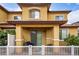 Covered patio with seating area and white fence at 7820 E Baseline Rd # 103, Mesa, AZ 85209