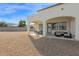 Spacious backyard with gravel and covered patio at 7917 S 32Nd Ter, Phoenix, AZ 85042