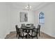 Formal dining room with round table and six chairs at 7917 S 32Nd Ter, Phoenix, AZ 85042