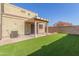 Artificial turf, pergola and home exterior at 8827 W Dahlia Dr, Peoria, AZ 85381