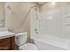 Bathroom with a shower/tub combo and white tile at 8827 W Dahlia Dr, Peoria, AZ 85381