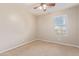 Bright bedroom with ceiling fan and window coverings at 8827 W Dahlia Dr, Peoria, AZ 85381