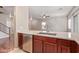 Kitchen island with double sink and modern faucet at 8827 W Dahlia Dr, Peoria, AZ 85381