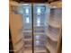 Spacious refrigerator with ample storage and twin cooling system at 8827 W Dahlia Dr, Peoria, AZ 85381