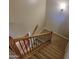 Indoor staircase with wood and metal railing at 8827 W Dahlia Dr, Peoria, AZ 85381