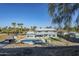 Aerial view showcasing the home's backyard oasis and pool at 925 W Fairway Dr, Mesa, AZ 85201