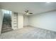 Spacious finished basement with built-in shelving and new carpet at 925 W Fairway Dr, Mesa, AZ 85201