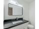 Modern bathroom with a sleek vanity and updated fixtures at 925 W Fairway Dr, Mesa, AZ 85201