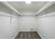 Spacious closet with double hanging rods and carpeted floor at 925 W Fairway Dr, Mesa, AZ 85201