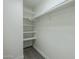 Bright closet with shelving and carpeted floor at 925 W Fairway Dr, Mesa, AZ 85201