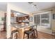 Kitchen island with seating provides extra workspace and dining at 9826 W Emberwood Dr, Sun City, AZ 85351