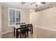 Casual dining area with a table and chairs near a window at 10506 W Pasadena Ave, Glendale, AZ 85307