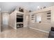 Living room showcasing built-in entertainment center and high ceilings at 10506 W Pasadena Ave, Glendale, AZ 85307