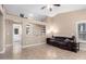 Living room with built-in shelving and a comfortable couch at 10506 W Pasadena Ave, Glendale, AZ 85307