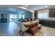 Kitchen dining area with wooden table and bench seating at 10834 W Swayback Pass, Peoria, AZ 85383