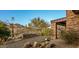 Spacious backyard with stone wall and mountain views at 10962 E Old Trails Rd, Scottsdale, AZ 85262