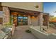 Outdoor patio with built-in grill and stone features at 10962 E Old Trails Rd, Scottsdale, AZ 85262