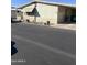 Mobile home with parking and desert landscaping at 11596 W Sierra Dawn Blvd # 105, Surprise, AZ 85378