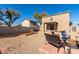 Spacious backyard with fire pit and seating area at 13185 W Calavar Rd, Surprise, AZ 85379