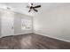 Bright entryway with hardwood floors and window at 13185 W Calavar Rd, Surprise, AZ 85379