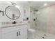 Clean bathroom with a modern vanity and shower at 13223 W Gaucho Dr, Sun City West, AZ 85375