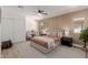 Comfortable bedroom with a ceiling fan and neutral tones at 13223 W Gaucho Dr, Sun City West, AZ 85375