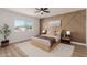 Bright bedroom with a neutral color palette and stylish decor at 13223 W Gaucho Dr, Sun City West, AZ 85375