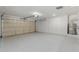 Attached garage with ample storage cabinets at 13223 W Gaucho Dr, Sun City West, AZ 85375