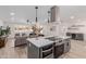 Modern kitchen with large island and stainless steel appliances at 13223 W Gaucho Dr, Sun City West, AZ 85375