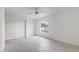 Bright bedroom features tile floors, sliding closet, and a ceiling fan at 13804 N 52Nd Dr, Glendale, AZ 85306