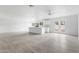 Open-concept living room featuring hardwood floors, white walls, and bright, natural light at 13804 N 52Nd Dr, Glendale, AZ 85306