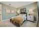 Serene bedroom with neutral walls, carpeted floor, and a cozy blanket at 1431 W J Waltz Way, Apache Junction, AZ 85120