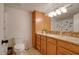 Bathroom with granite vanity and updated fixtures at 14840 N 21St St, Phoenix, AZ 85022